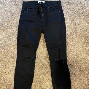 1969 GAP True Skinny Black Destroyed denim jeans.